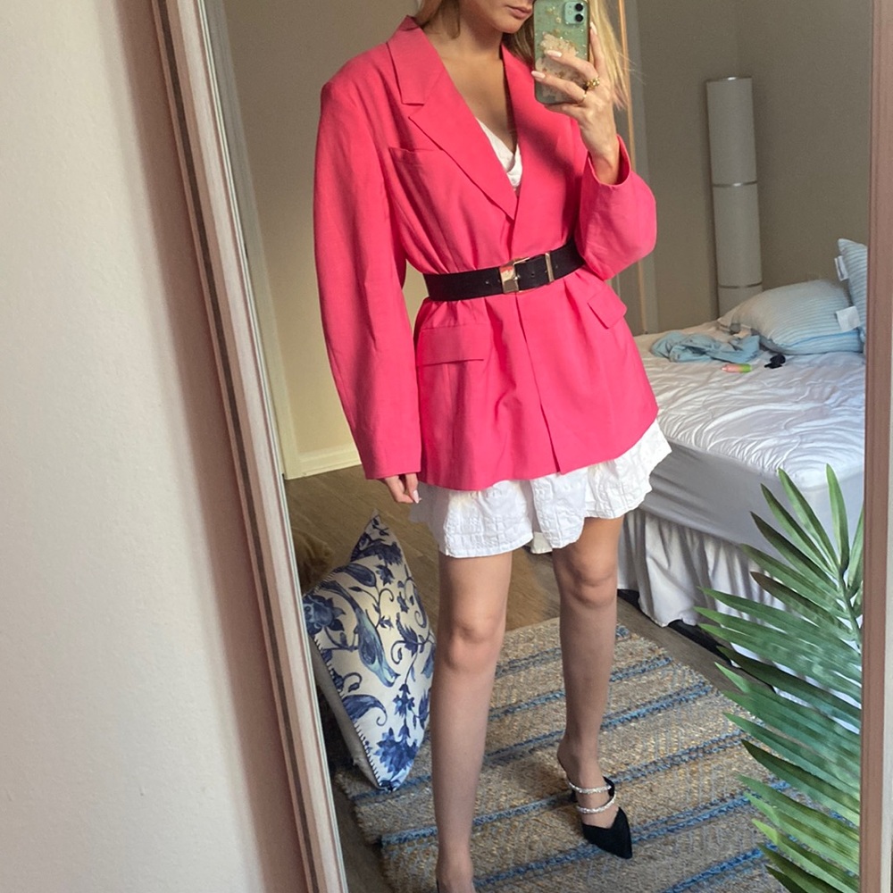 Worn oversized pink neon blazer jacket.